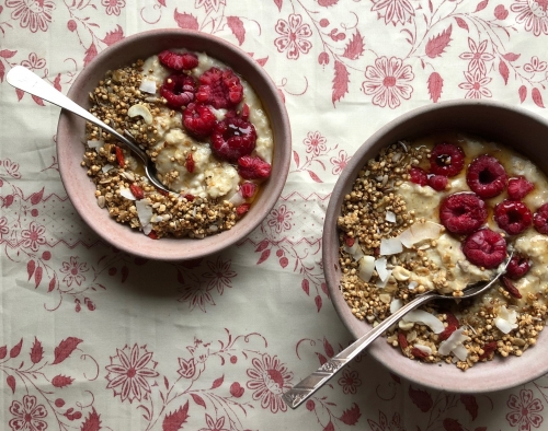 Oatmilk Porridge with Quinoa Granola and Raspberries by Trish Deseine